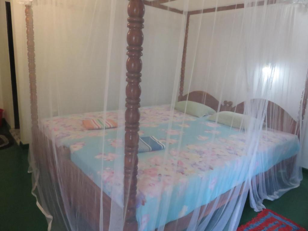 Postel nebo postele na pokoji v ubytování Beach Lagoon Guesthouse