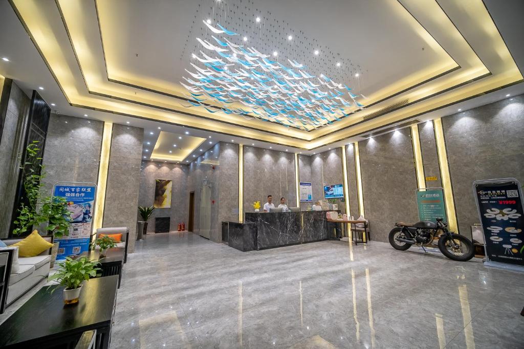 TV a/nebo společenská místnost v ubytování Zhongshan Bafei Hotel
