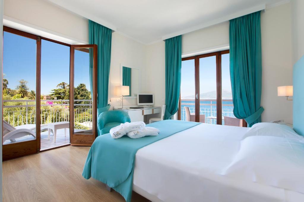 Postel nebo postele na pokoji v ubytování Boutique Hotel Regina