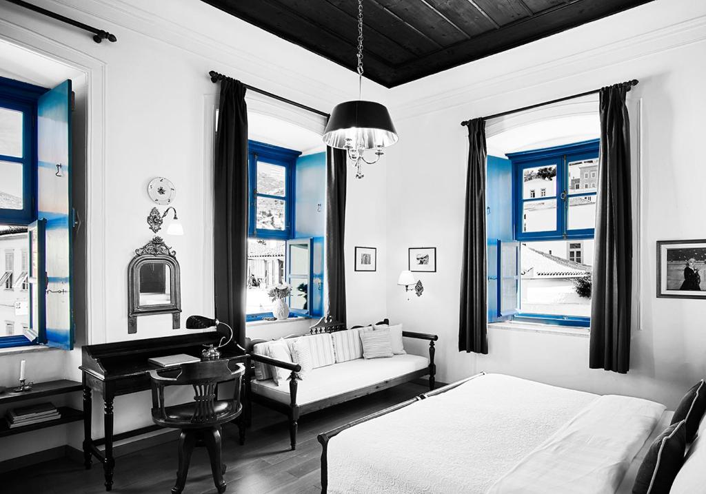 Postel nebo postele na pokoji v ubytování Orloff Boutique Hotel