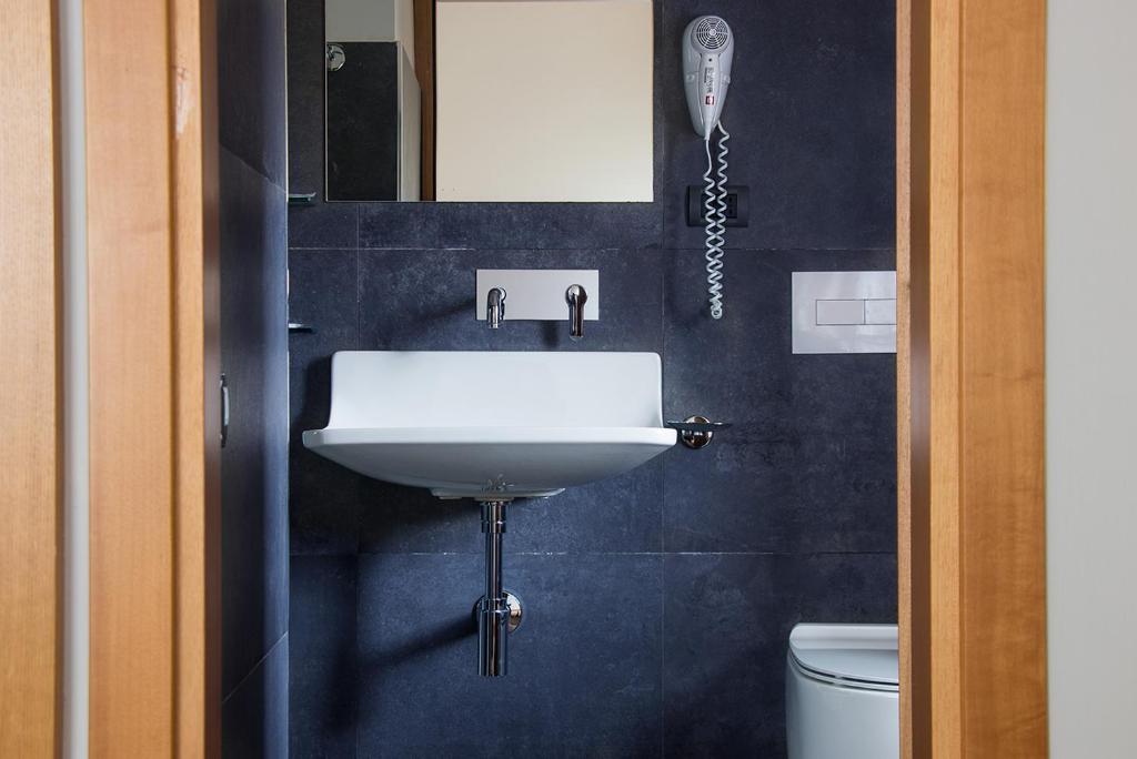 Koupelna v ubytování Hotel Clarici