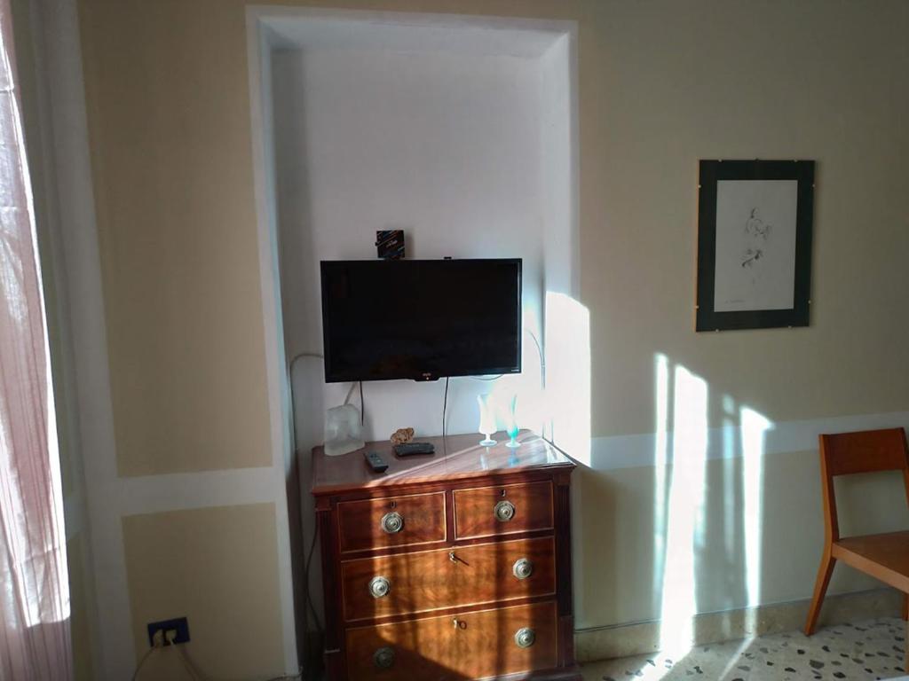 TV a/nebo společenská místnost v ubytování Il Genio del Porto - Mabbonath b&b