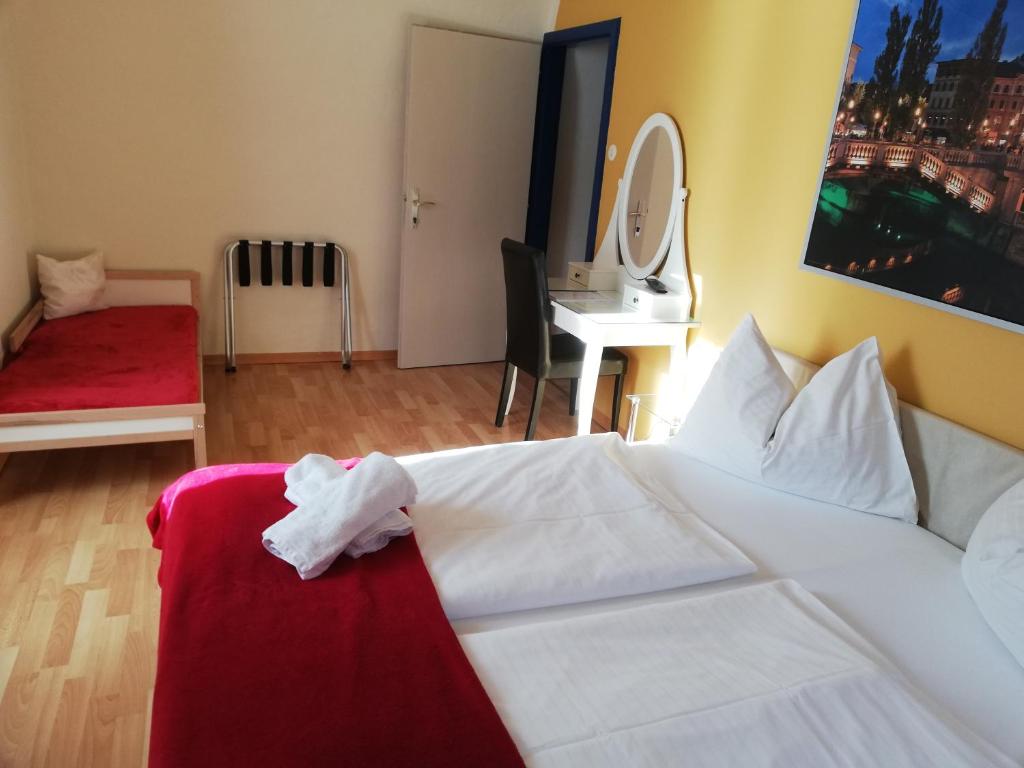 Postel nebo postele na pokoji v ubytování Hotel Kirchenwirt