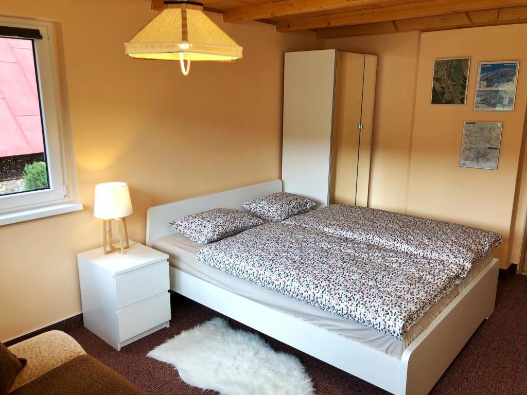 Letto o letti in una camera di Horský dům Pernink
