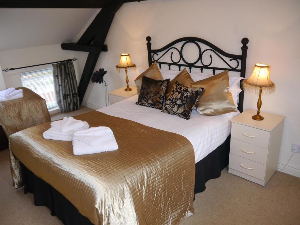 Krevet ili kreveti u jedinici u okviru objekta Hamlet Cottage sleeps 3-4 Stratford upon Avon