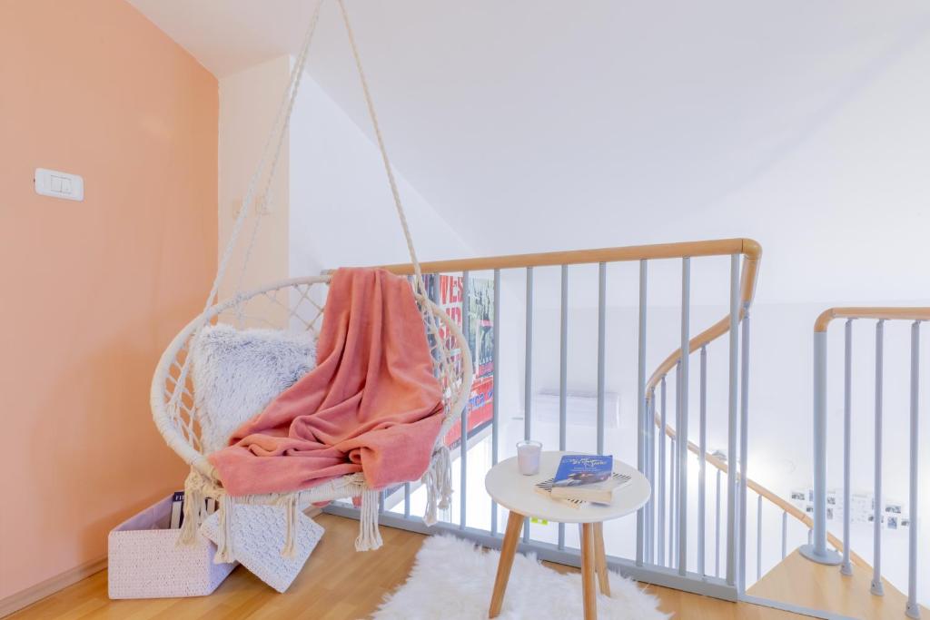 Łóżko lub łóżka w pokoju w obiekcie Center Penthouse Apartment