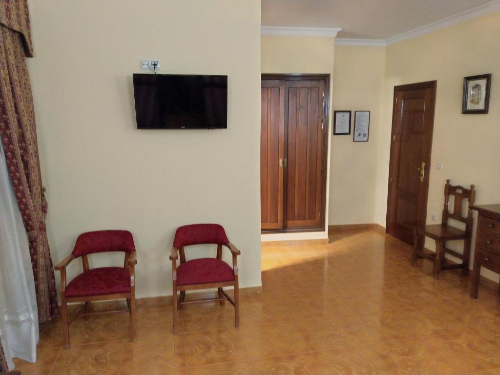 TV a/nebo společenská místnost v ubytování Hostal Bellido