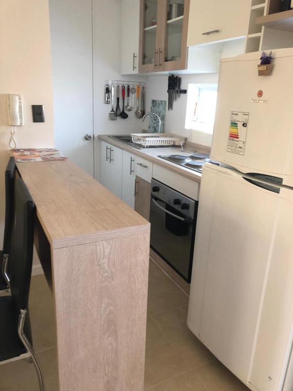Kuchyň nebo kuchyňský kout v ubytování Departamento Nuevo