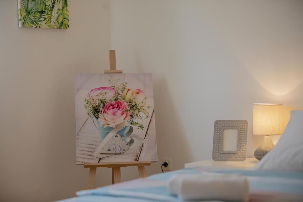 Łóżko lub łóżka w pokoju w obiekcie Center Penthouse Apartment