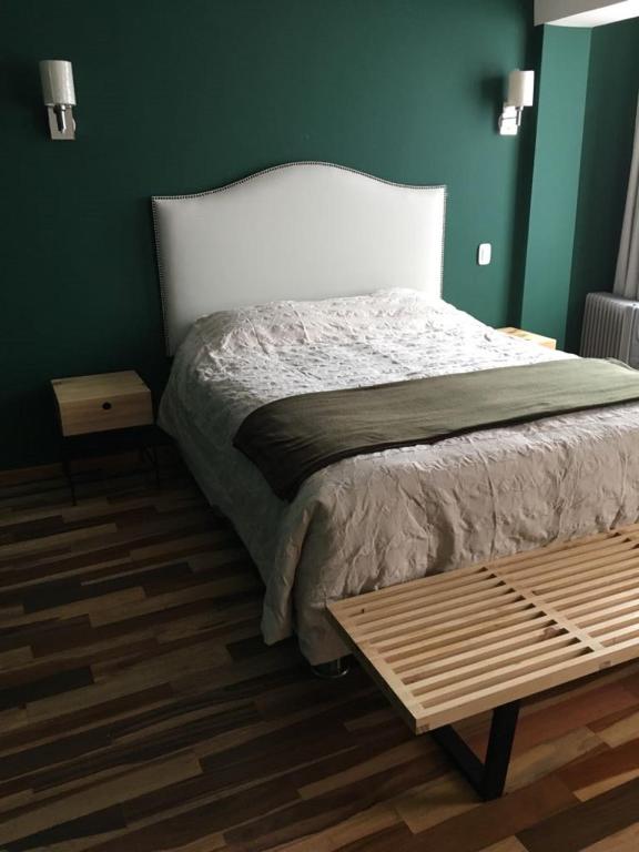 Postel nebo postele na pokoji v ubytování Anden Inca Hotel