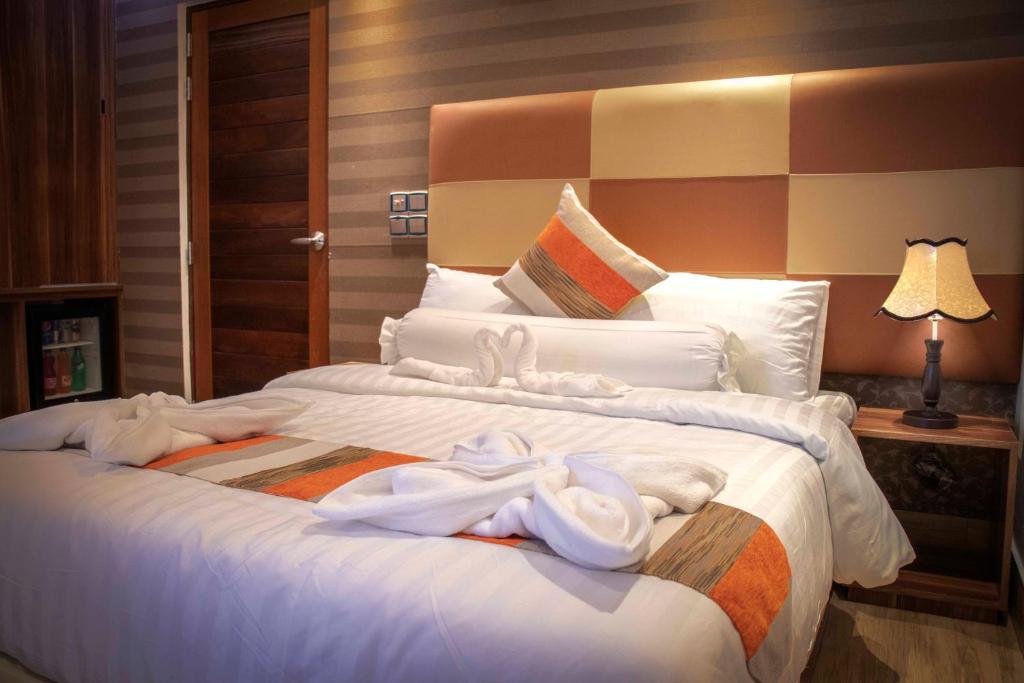 Postel nebo postele na pokoji v ubytování Rosy Villa Hotel