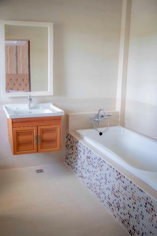 Koupelna v ubytování Rosy Villa Hotel