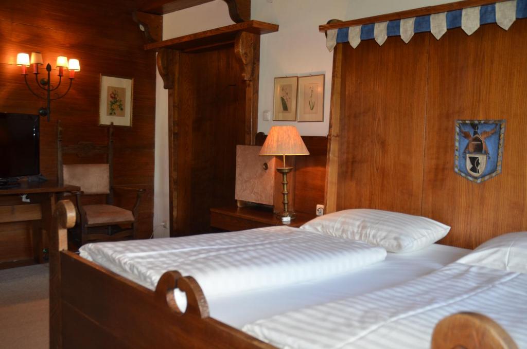 Postel nebo postele na pokoji v ubytování Schloss Münichau