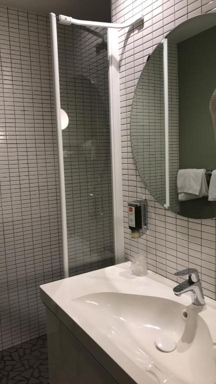 Koupelna v ubytování Hôtel Vulcain