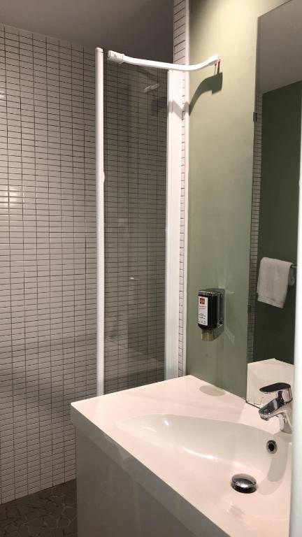 Koupelna v ubytování Hôtel Vulcain