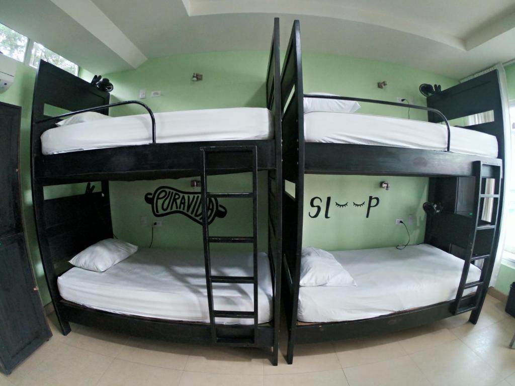 Postel nebo postele na pokoji v ubytování Room2Board Hostel and Surf School