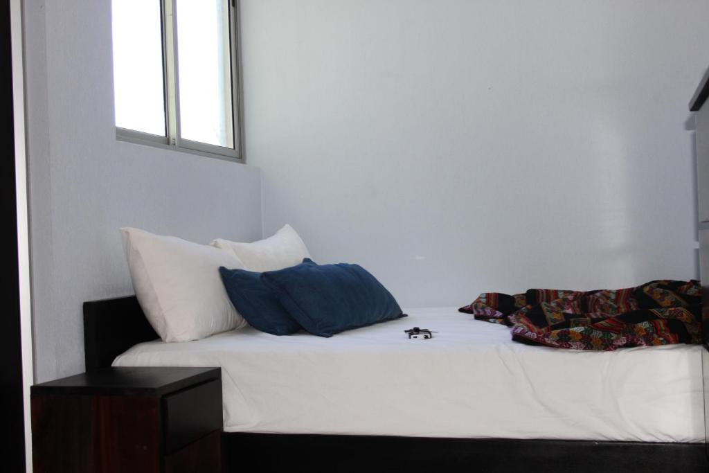 Postel nebo postele na pokoji v ubytování Room2Board Hostel and Surf School