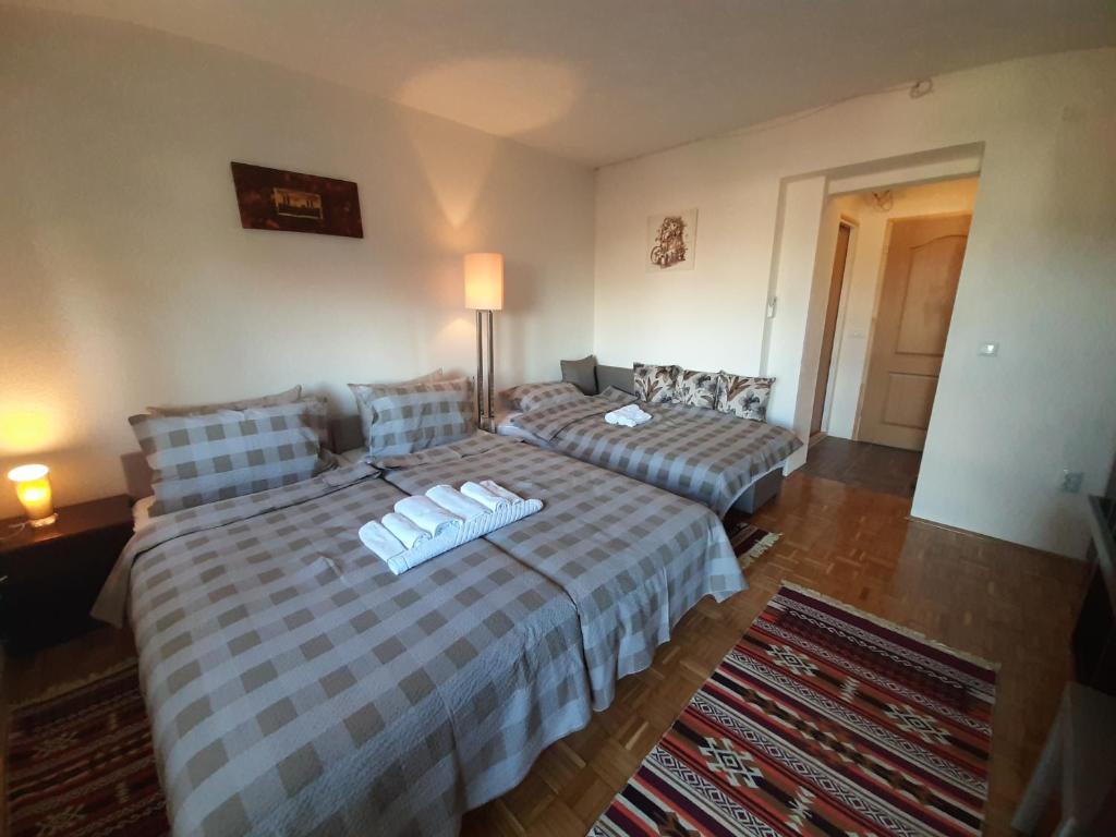 Postel nebo postele na pokoji v ubytování Guesthouse Hill