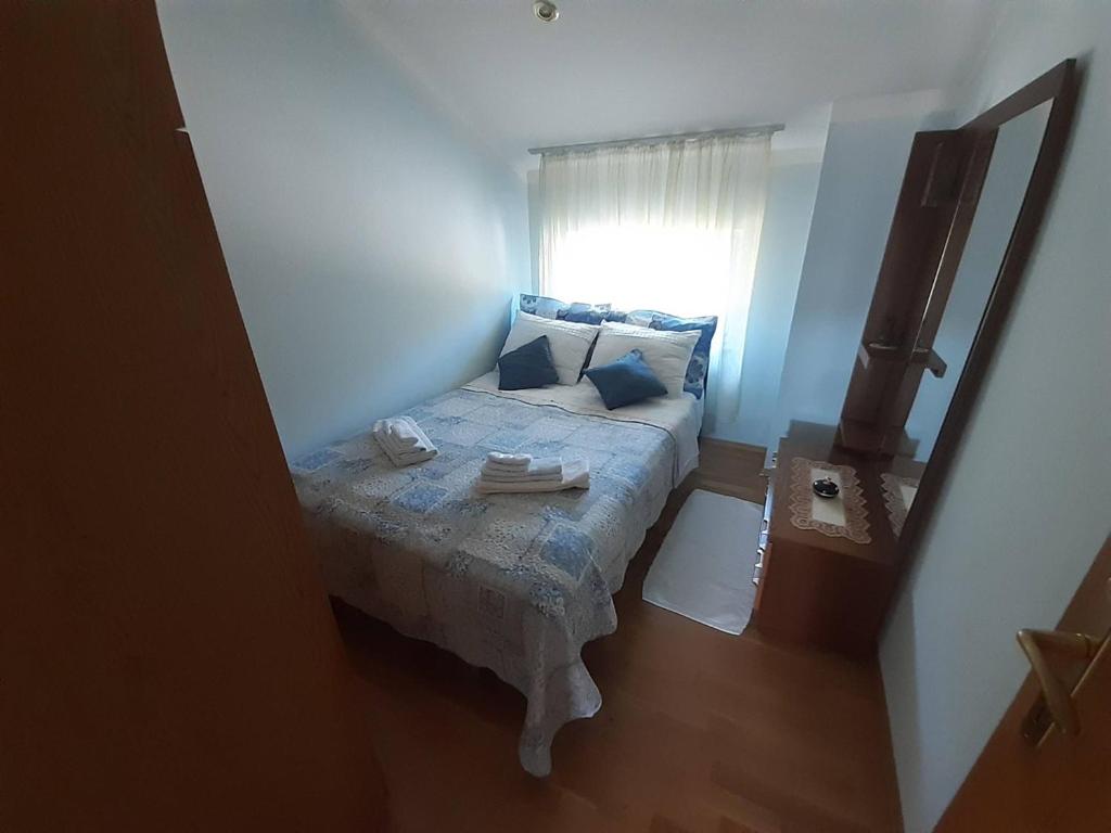 Łóżko lub łóżka w pokoju w obiekcie Apartment Villa Brig
