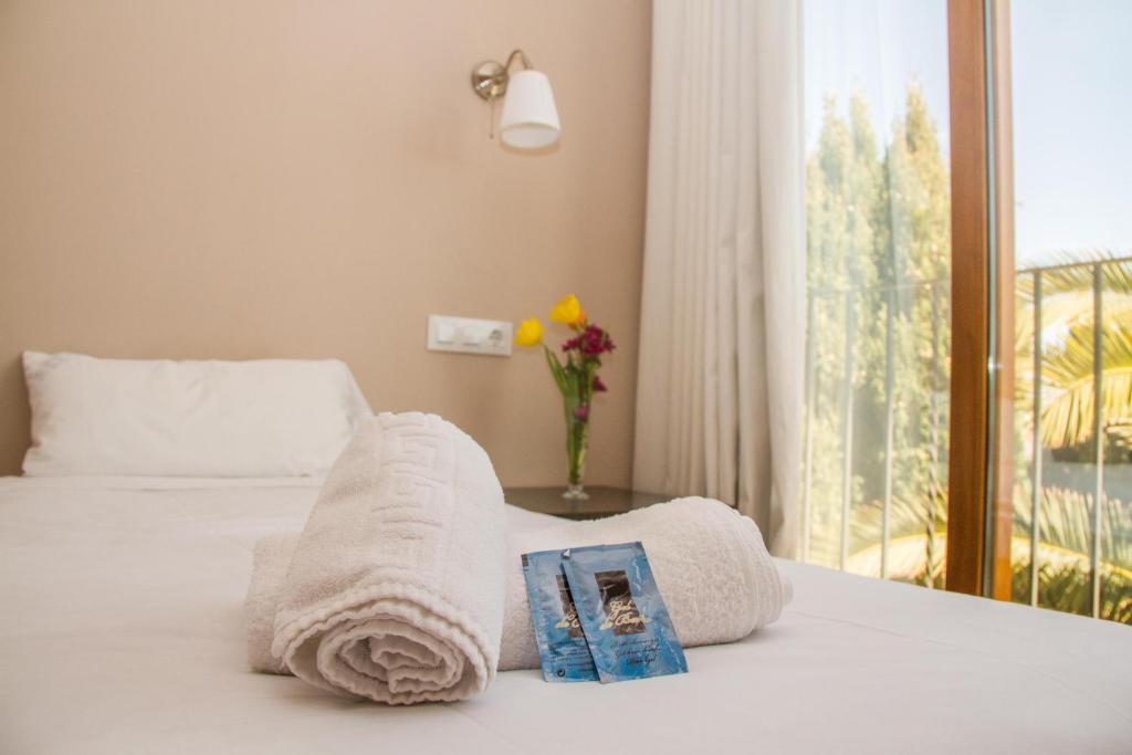 Postel nebo postele na pokoji v ubytování Hostal Gran Sol
