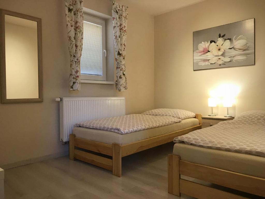 Postel nebo postele na pokoji v ubytování Apartmán 501