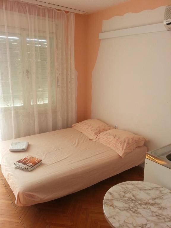 Postel nebo postele na pokoji v ubytování Marijanka