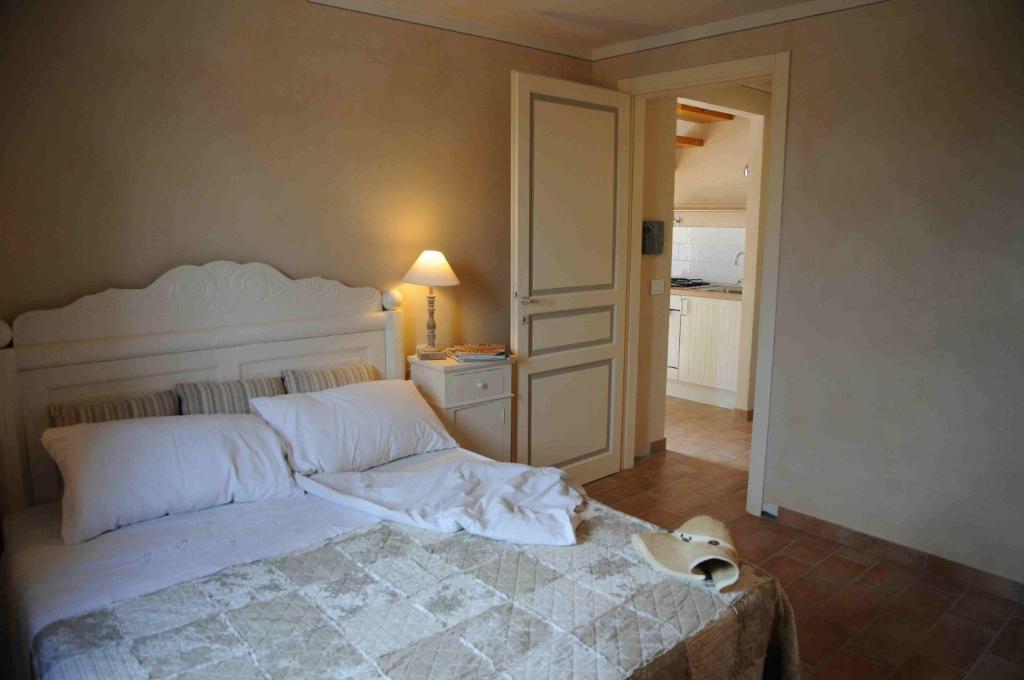 Postel nebo postele na pokoji v ubytování Podere Calledro