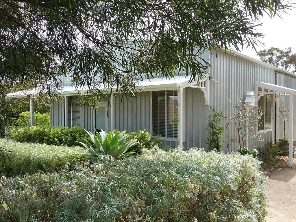 a house with a garden in front of it at Watson Park in Yankalilla