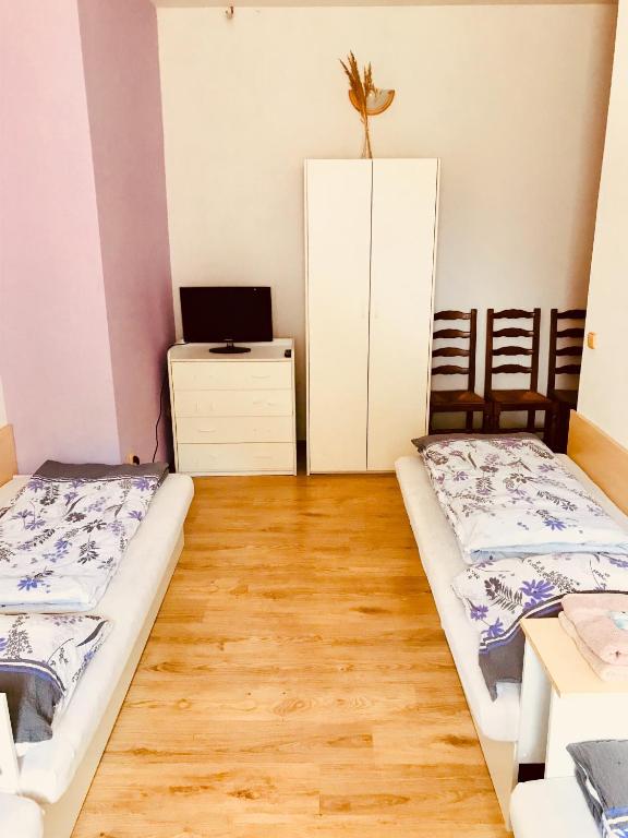 Postel nebo postele na pokoji v ubytování Restaurace penzion Pod Šumárníkem