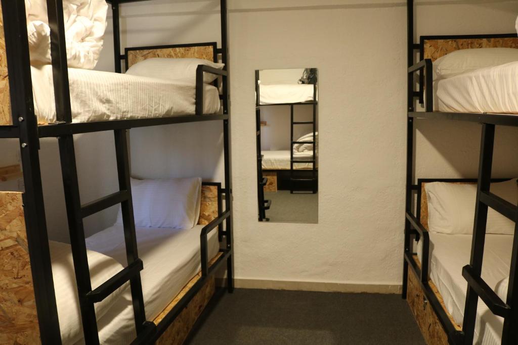Postel nebo postele na pokoji v ubytování Nomads Hotel Petra