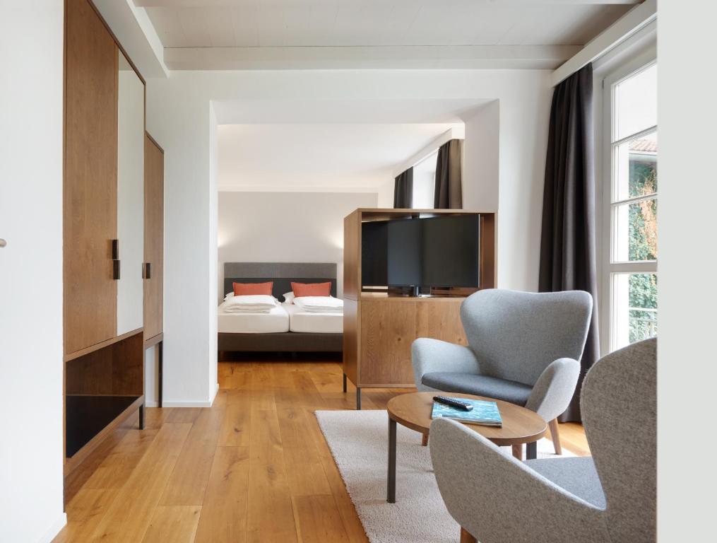 Łóżko lub łóżka w pokoju w obiekcie Hotel Teutschhaus