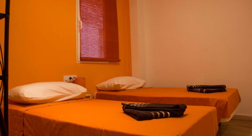 Posteľ alebo postele v izbe v ubytovaní Colors Rooms