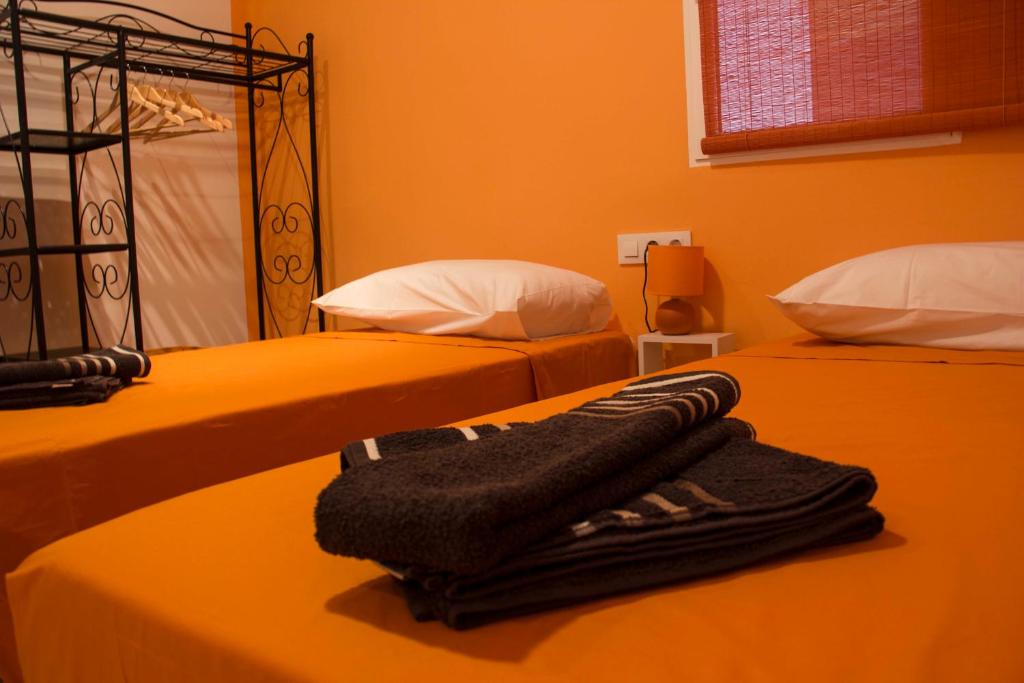 Posteľ alebo postele v izbe v ubytovaní Colors Rooms