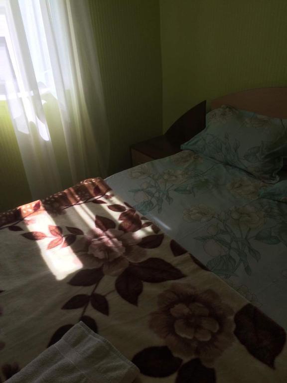 Postel nebo postele na pokoji v ubytování Mushkudiani Manor