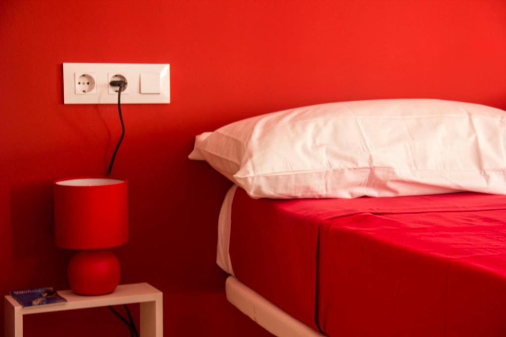 Posteľ alebo postele v izbe v ubytovaní Colors Rooms