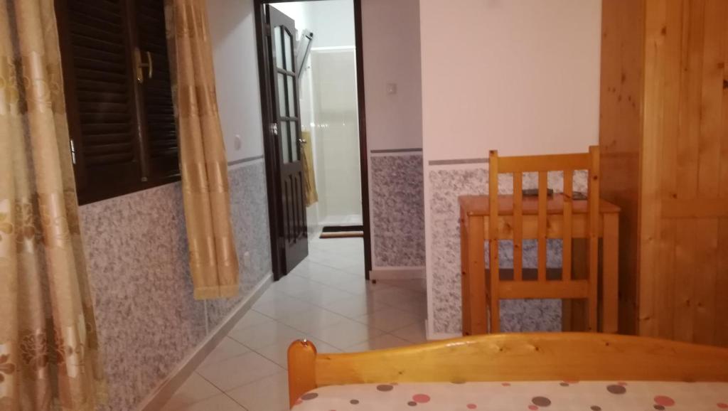Postel nebo postele na pokoji v ubytování Basic Hotel