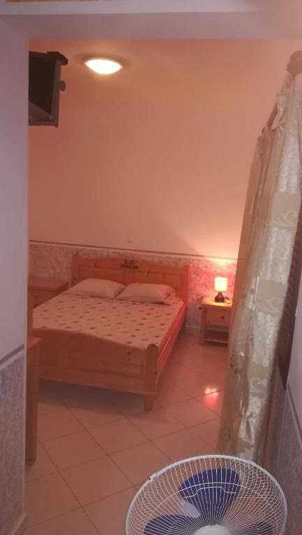 Postel nebo postele na pokoji v ubytování Basic Hotel