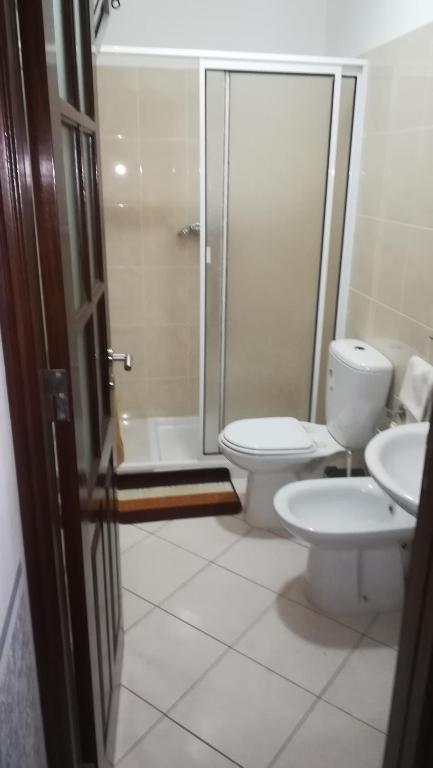 Koupelna v ubytování Basic Hotel