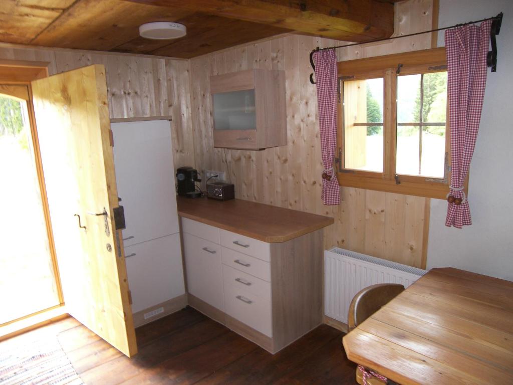 Kuchyň nebo kuchyňský kout v ubytování Ferienhütte Troadkostn