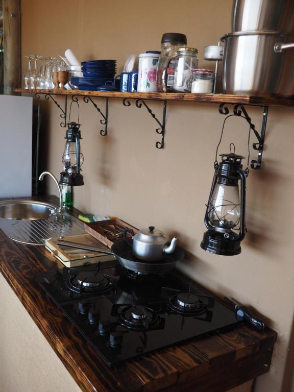 Kuchyň nebo kuchyňský kout v ubytování Pure Nature Familodge