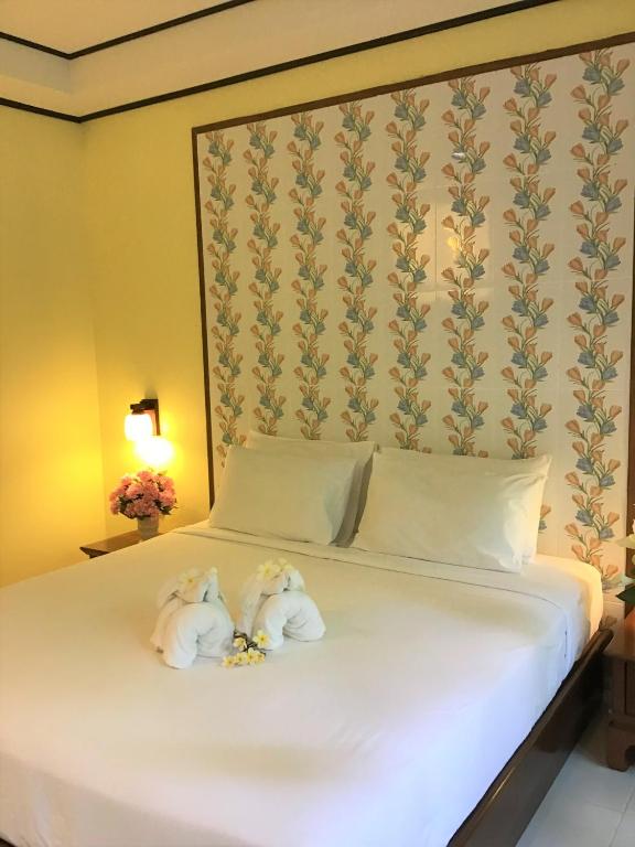 Postel nebo postele na pokoji v ubytování Pratum Resort