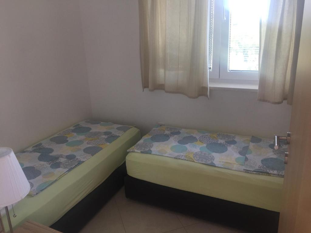 Posteľ alebo postele v izbe v ubytovaní Villa Lanterna