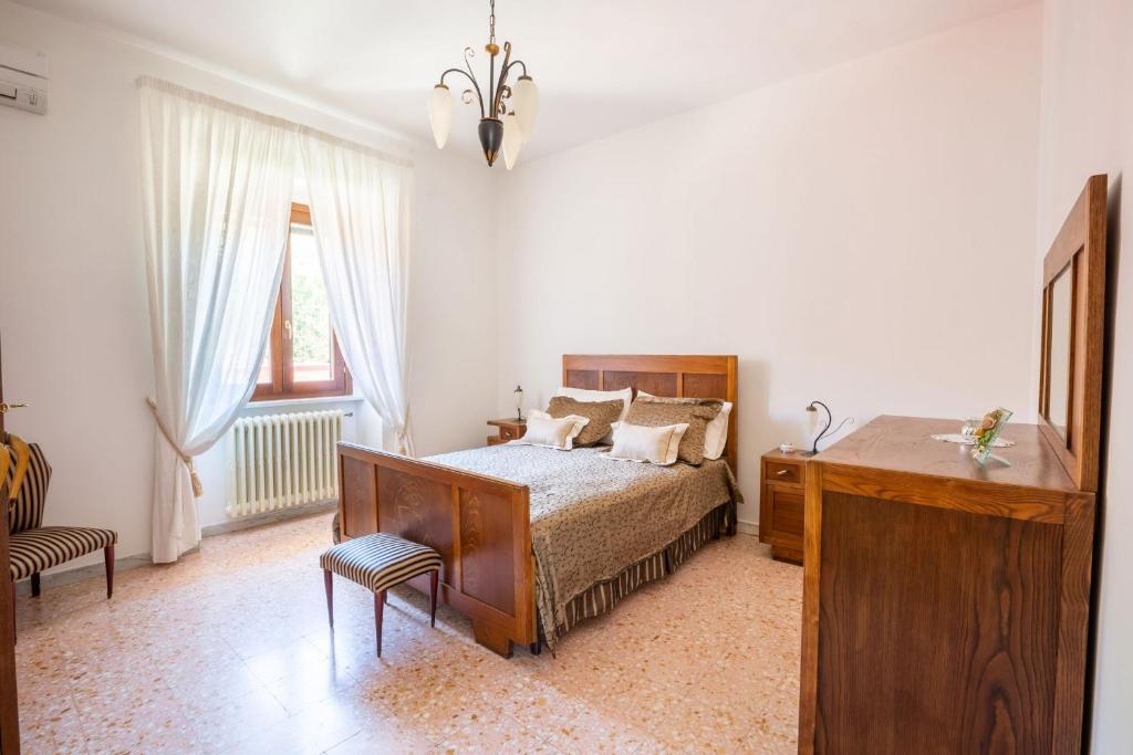 Postel nebo postele na pokoji v ubytování Valle Fiorita