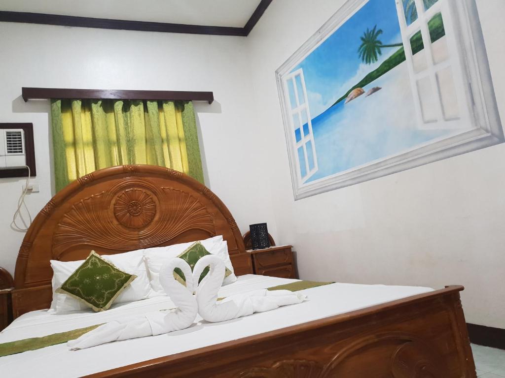 Postel nebo postele na pokoji v ubytování Brazaville Beach Resort