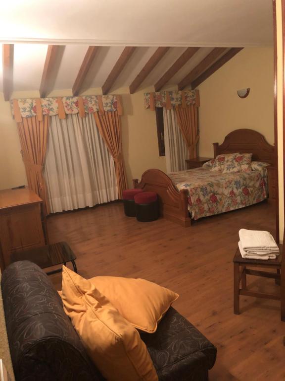 Posezení v ubytování HOSTAL EL ESCUDO