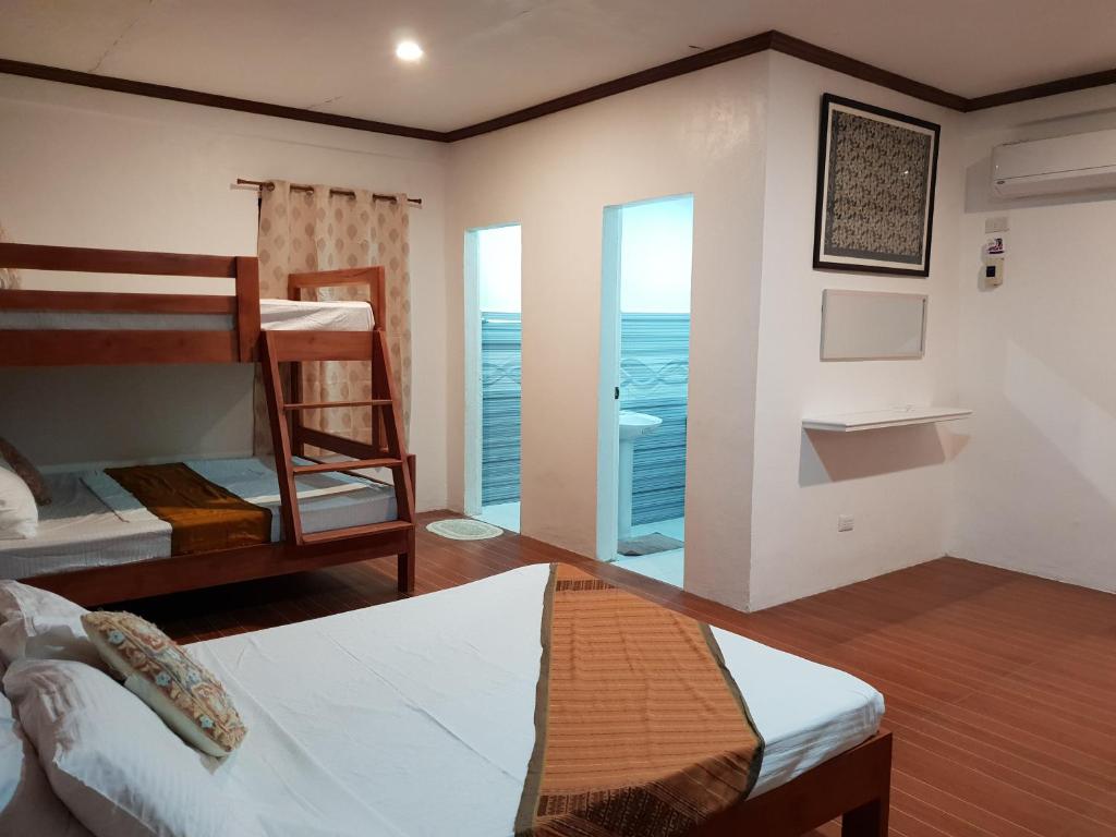 Postel nebo postele na pokoji v ubytování Brazaville Beach Resort