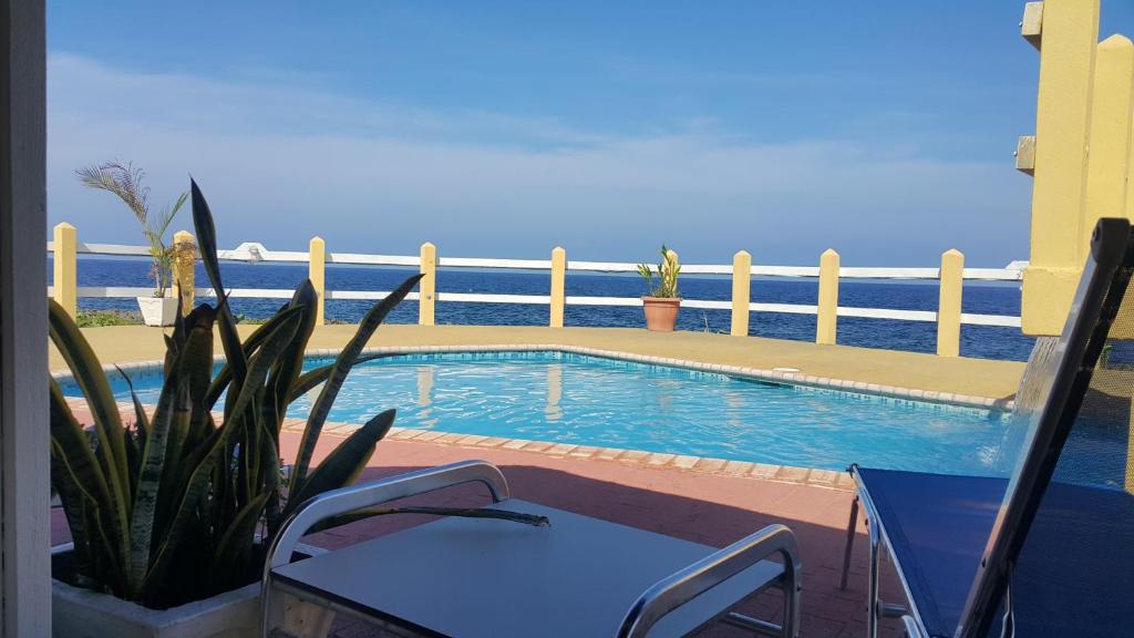 Bassein majutusasutuses Seagrape Plantation Resort & Dive Center või selle lähedal