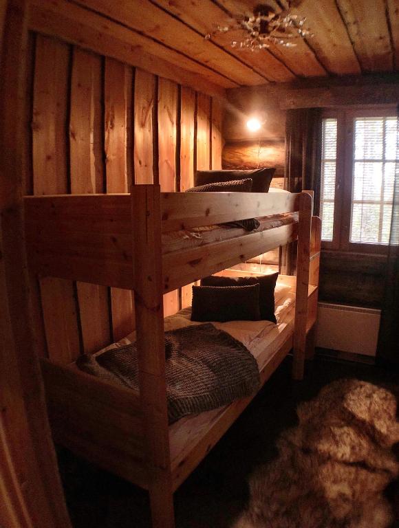 Кровать или кровати в номере Ruka Chalet Plage Oliver