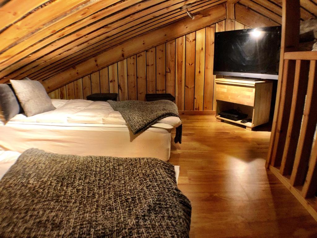 Кровать или кровати в номере Ruka Chalet Plage Oliver