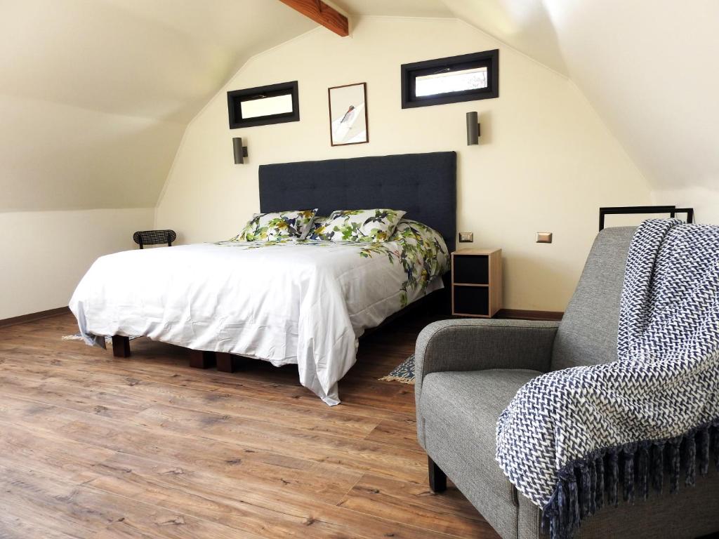 Uma cama ou camas num quarto em Rucatalca Bed and Breakfast